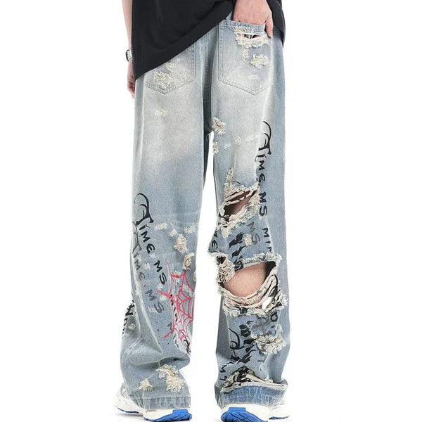 MELTEDSMILE® LIGHT BLUE RIPPED JEANS – SPIDER WEB EDITION