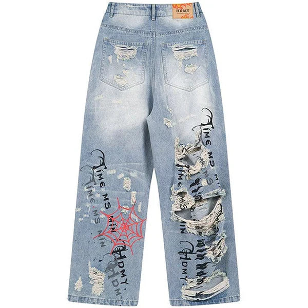MELTEDSMILE® LIGHT BLUE RIPPED JEANS – SPIDER WEB EDITION